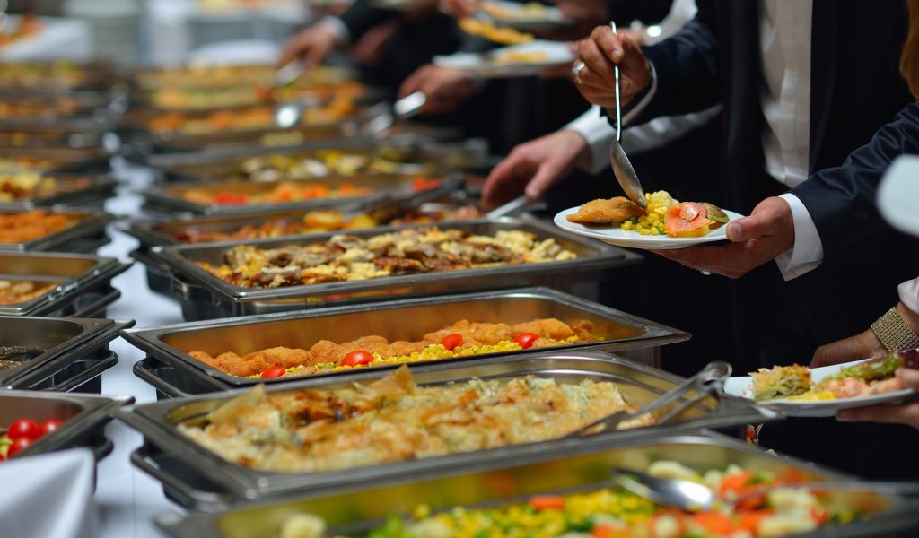 people group catering buffet food indoor in luxury restaurant with meat colorful fruits  and vegetables